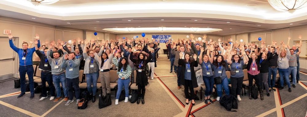 AllHands2024-group-hands_up